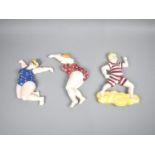 A Collection of Three Ceramic Wall Plaques Depicting Figures in Swimming Costumes, 20cm high