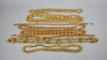 A Collection of Various Vintage Amber Style Bead Necklaces