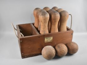 A Hand Made Set of Wooden Skittles by John Davies, Much Wenlock, with Three Skittle Balls, in