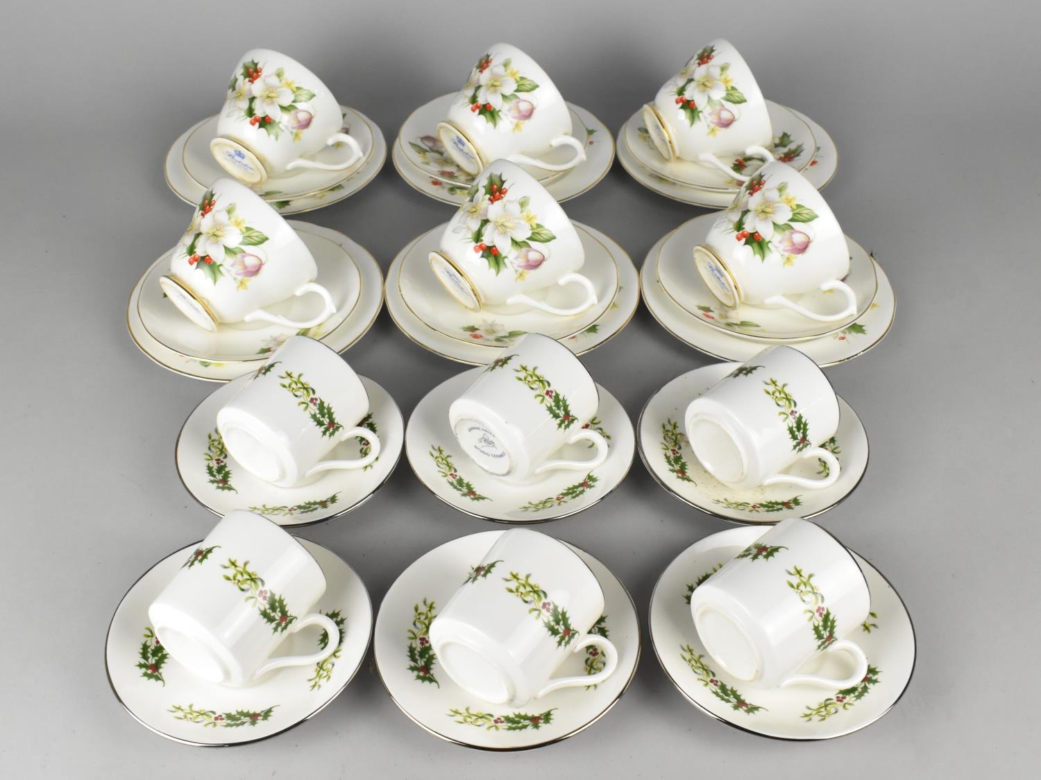 A Jannie Hayes Studio Ceramic Holly and Mistletoe Decorated Coffee Set for Six Together with a