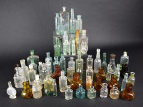 A Collection of Various Vintage Glass Bottles and Pots etc