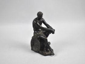 A Weighted Bronze Figure of a Seated Classical Warrior with Cherub at Feet, Possible a French