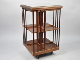 A Reproduction Inlaid Revolving Mahogany Bookcase, 47cms Square