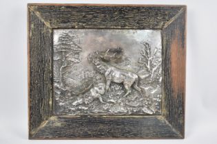 A Continental Oak Framed Silver Plated Plaque Decorated in Relief with Triumphant Stag Roaring