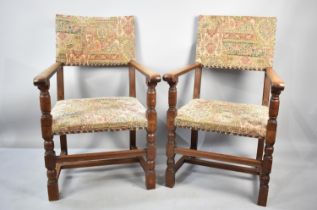 A Pair of Tapestry Upholstered Oak Framed Scroll Armchairs with Brass Studding