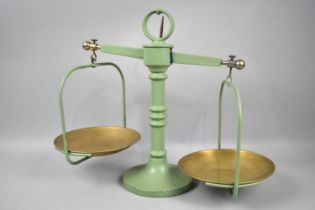 A Set of Green Painted Metal Kitchen Pan Scales with Brass Mounts, 35.5cms High