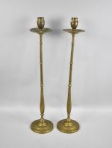 A Pair of Tall Slender Brass Candlesticks, 55cms High