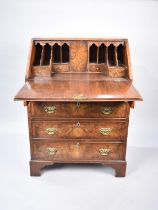 A Mid 20th Century Burr Walnut Crossbanded Fall Front Bureau with Fitted Interior and Four Long