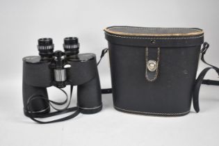 A Pair of Chinon Leather Cased 10x50 Field Binoculars