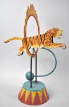 A Modern Vintage Style Articulated Metal Ornament Depicting Tiger Jumping Through Flaming Hoop,