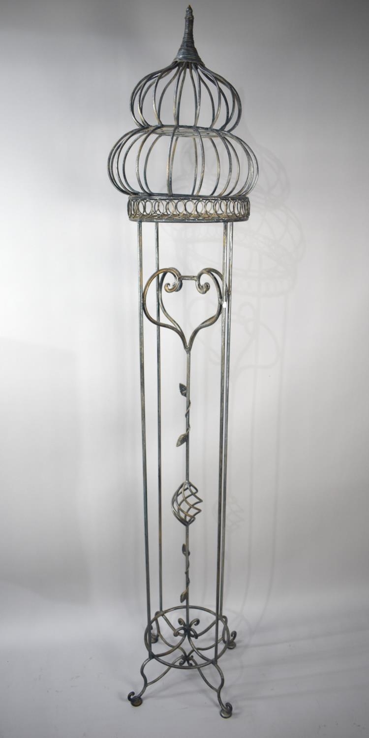 A Modern Wrought Iron Plant Stand with unrelated Minaret Top, Overall Height 198cms