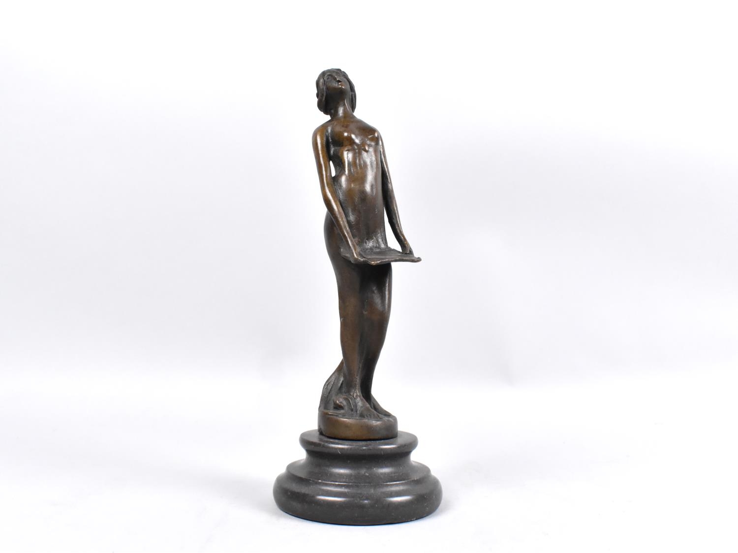A Bronze Study of Standing Maiden with Tray, Turned Stepped Socle, 19cms High