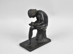 A Patinated Bronze Study of a Seated Nude Removing Splinter from Foot, 15.5cms High