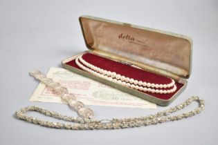 Delta Shell Simulated Pearl Necklace Together with a Silver Bracelet and Necklace