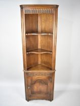 A Mid 20th Century Oak Free Standing Corner Cabinet with Cupboard base, 59cm wide