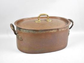 A Late Victorian/Edwardian Copper Two Handled Lidded Cooking Pot, 48cms Wide