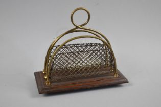 A Late Victorian/Edwardian Brass Two Division Letter Rack on Oak Plinth, 18cms Wide