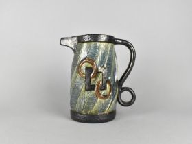 A J Haynes Studio Pottery Jug with Double Loop Handle and Reeded Body Decorated in Shallow Relief