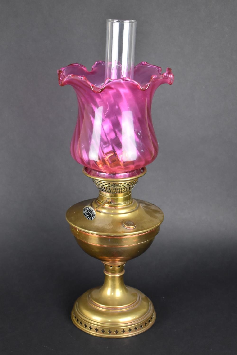 An Early 20th Century Brass Oil Lamp with Cranberry Glass Shade and Plain Glass Chimney, 57cms High - Image 2 of 2