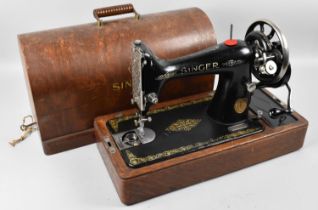 A Vintage Cased Manual Singer Sewing Machine