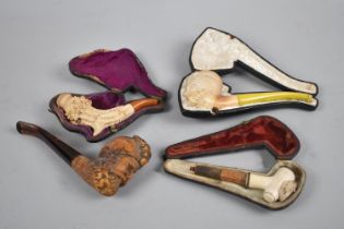 A Collection of Four Vintage Pipes in Meerschaum, Two Turks Head with Amber Stems and Two Smaller