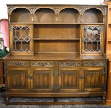 A Mid 20th Century Old Charm Oak Linenfold Dresser, the Base with Four Short Drawers Over