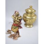 A Polished Bronze Lidded Temple Jar Decorated with Oriental Scene together with a Brass and Silk