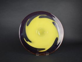 A Large Studio Glass Pedestal Plate, Yellow Trim and Splat on Plain and Purple Ground, 35.5cm