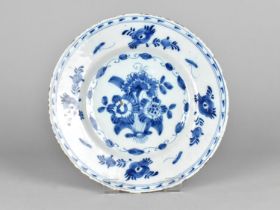 An 18th Century Delft Tin Glazed Plate with Floral Motif, 23cm Diameter