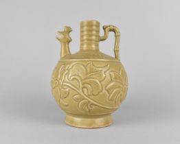 A Chinese Celadon Ewer the Body Decorated with Incised Foliage Design and Having Zoomorphic Spout,