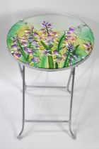 A Modern Folding Table Decorated with Flowers, 35cms Diameter