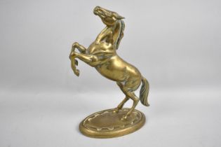 A Modern Cast Brass Model of a Rearing Stallion, 26cms High