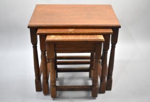 A Mid/Late 20th Century Oak Nest of Three Tables, 51cms Wide