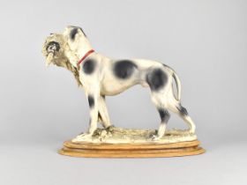 A Large Resin Study of Sporting Dog Carrying Cock Pheasant on Oval Plinth Base, 38cms Wide