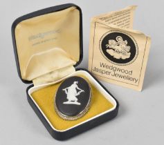 A Boxed Wedgwood Black Jasperware Oval Brooch in White Metal Mount