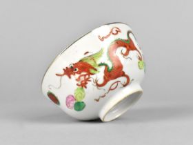 A Chinese Porcelain Tea Bowl Decorated in Polychrome Detailing Dragon and Phoenix, Four Character