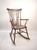 A Mid 20th Century Oak Rocking Chair with Pierced Splat