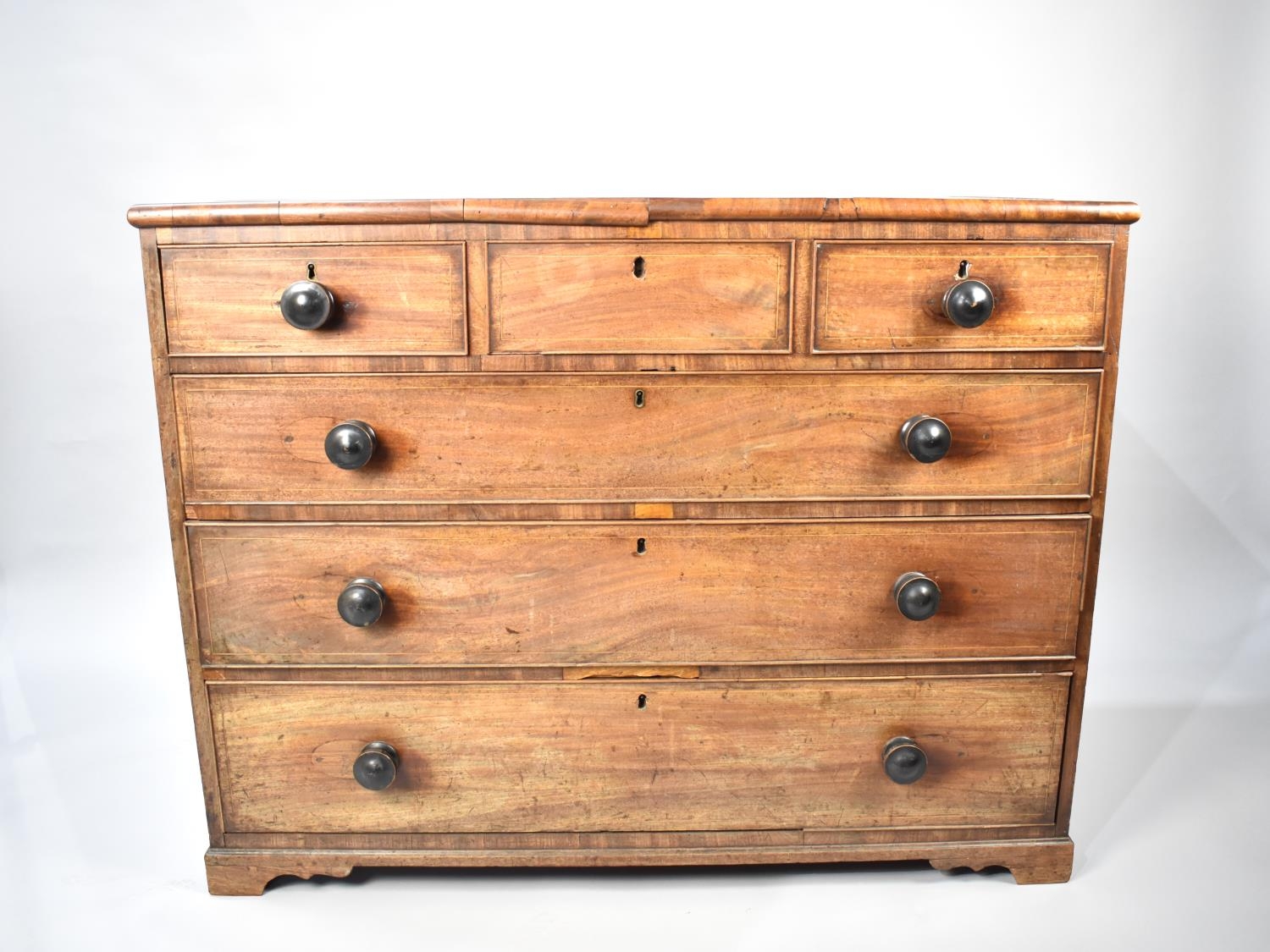 A 19th Century String Inlaid Mahogany Bedroom Chest of Three Short Drawers over Three Long