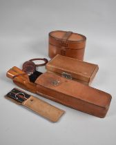 A Collection of Vintage Leather Cases and an Oval Pocket Mirror