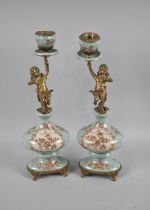 A Pair of Bronze and Porcelain French Style Figural Candlesticks, Holder Supported by Cherubs, 36cms