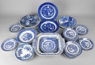 A Collection of Mid 20th Century Blue and White Willow Pattern and Other Plates and Saucers