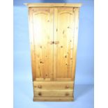 A Modern Pine Wardrobe with Two Base Drawers, 87cms Wide