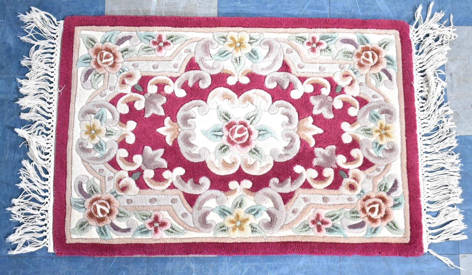 A Small Hearth Rug on Red Ground,91x61cms