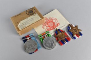 An Original Cardboard Box Containing Four WWII Medals Awarded to P Barraclough