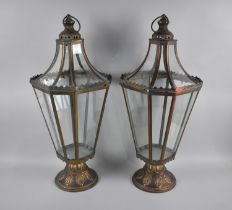 A Pair of Patinated Bronze Effect Lanterns of Tapering Octagonal Form, 70cms High
