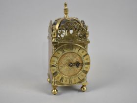 A Mid 20th Century Brass Lantern Clock with Battery Movement, 21.5cms High