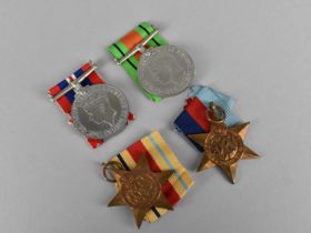 A Collection of Four WWII Medals to Comprise Defence Medal, 1939-45 Medal, 39-45 Star and Africa