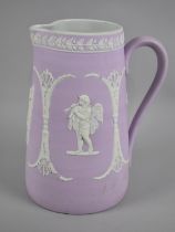 A Late 19th Century Pale Violet Jasperware Jug decorated with Cherubs, 22cms High