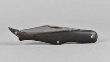 A 19th Century Gents Novelty Pocket Knife in the Form of a Ladies Booted Leg with Lambs Foot Scales,