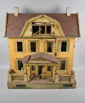 A Late Victorian/Edwardian Wooden Dolls House in Need of Substantial Repair and Renovation, 60cms